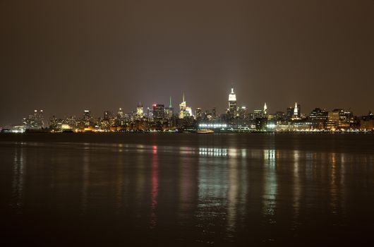 The New York City mid-town skylines at night 