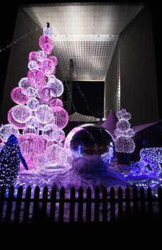 The Christmas Holiday Market at night in famous financial and business district of Paris - La Defense