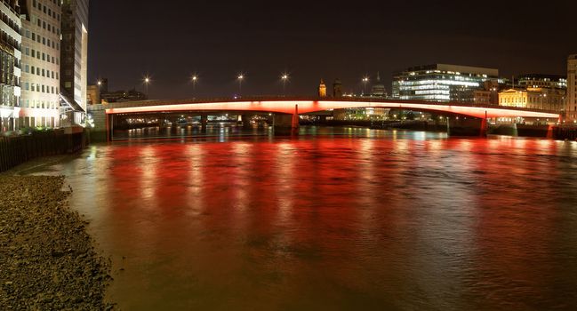 London Bridge with red and orange lights