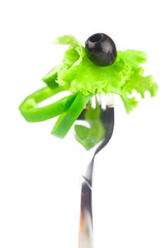 fork,black olive,lettuce and pepper isolated on white
