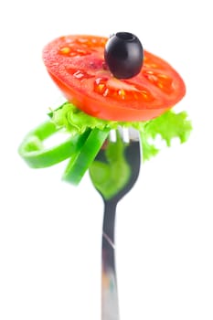 fork,black olive,lettuce, tomato and pepper isolated on white