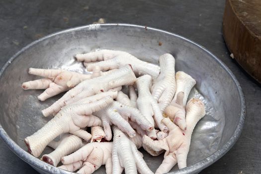 Raw Chicken Feet Claws at Southeast Asia Wet Market Closeup