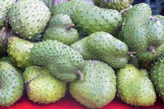 Soursop piled up at Fruit Vendor Stall in Southeast Asia