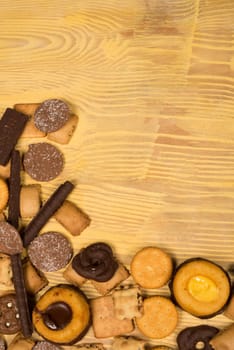 Assorted cookies set up on a wooden table