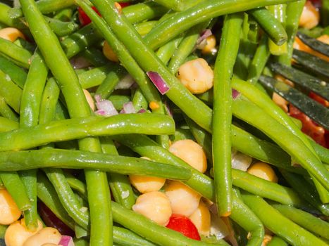 Mixed green and garbanzo beans with shallots.