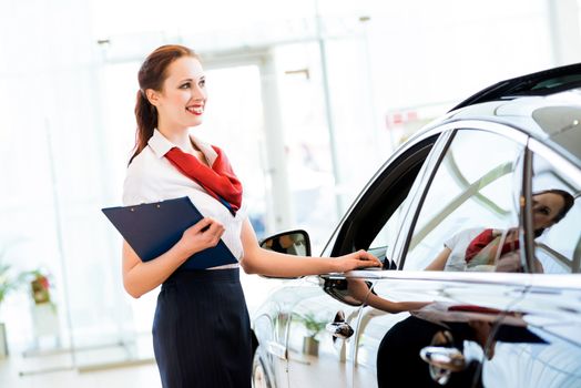 portrait of a young woman in a showroom consultant