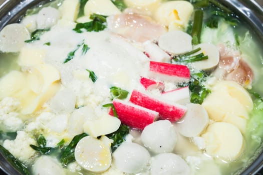 Boiling suki soup in big bowl, stock photo