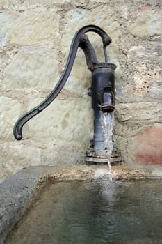 Close up on old fountain spout at castle of Chenaux in Estavayer-le-lac, Switzerland