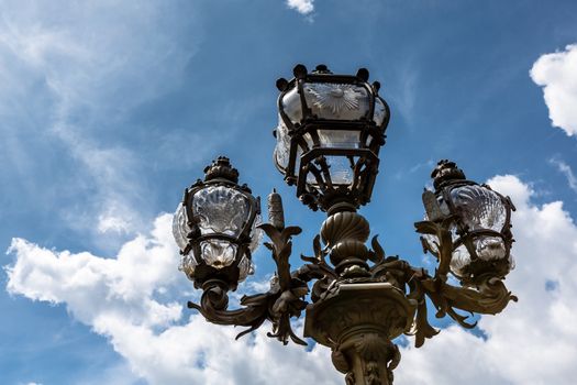 Street Lantern on the Alexandre III Bridge against Cloudy Sky, Paris, France.