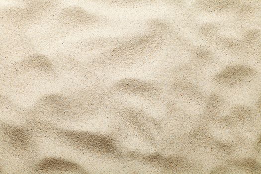 Sand texture. Beach background. Top view. Copy space