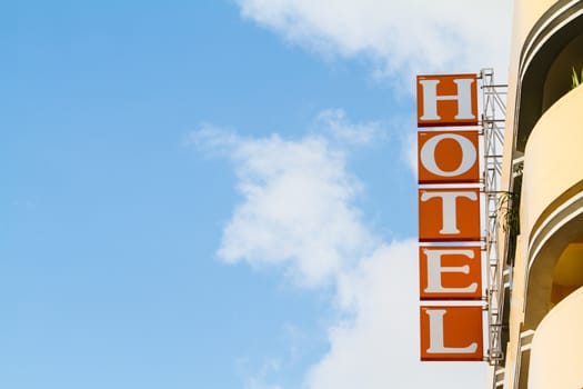 hotel sign  with blue sky.