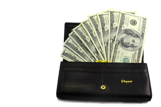 Black wallet with dollar bills in a hundred dollars on a white background