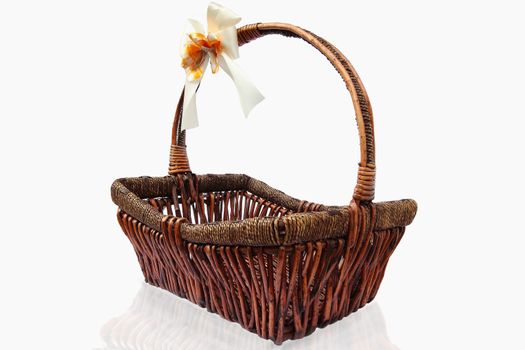 Empty wicker basket isolated on white background