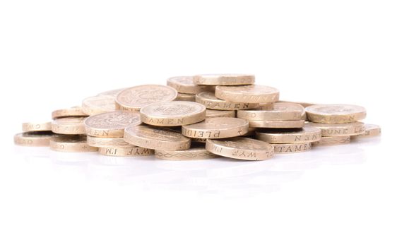 a pile of pouns coins isolated on white background