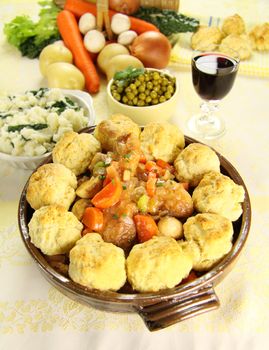 Delicious chicken and dumpling casserole with a selection of garden fresh vegetables.