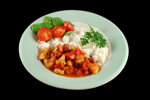 Spicy chicken lentil and pepper stew with rice and a fresh garden salad.