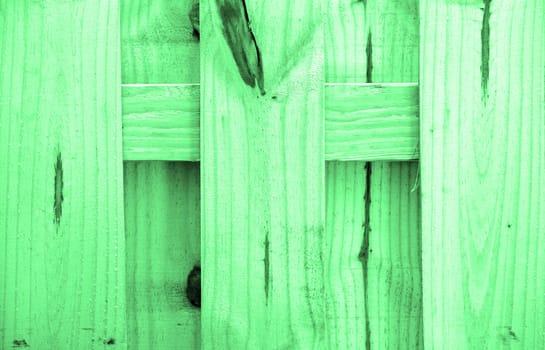 a green wood fence for a textured background