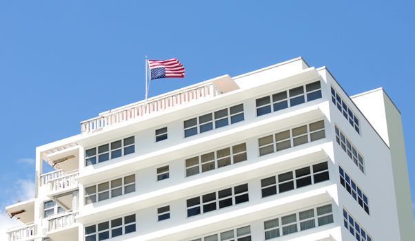 upside down American flag on building that conveys a message of distress