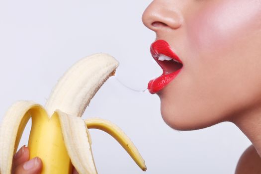 Suggestive Sensual Woman Preparing to Eat a Banana 