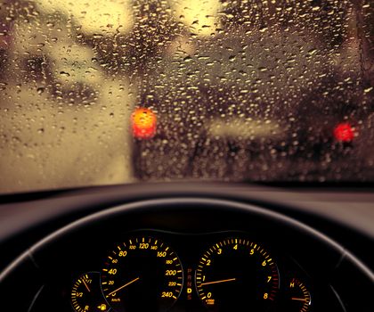 rain droplets on car windshield, blocked traffic