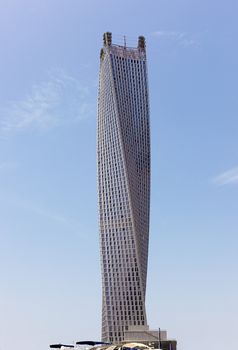 The world's tallest twisted tower in Dubai. Located by Dubai Marina, the 75-storey building rises to a height of 1,010ft (307 metres) and houses 495 apartments. The swerve of the structure will mean residents in the lower part of the tower will find their view oriented towards the waterfront promenade of Dubai Marina; those on the upper floors are rotated to face the Persian Gulf.