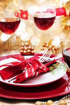 Decorated Christmas Dinner Table with Red Wine