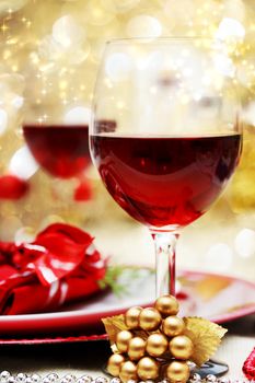 Decorated Christmas Dinner Table with Red Wine