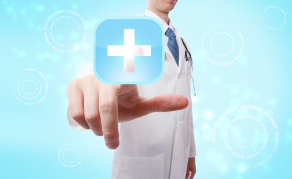 Medical doctor pushing a blue and white medical cross icon over light blue background