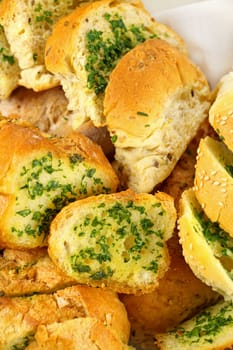 Delicious homemade herb and garlic crusty bread ready to serve.