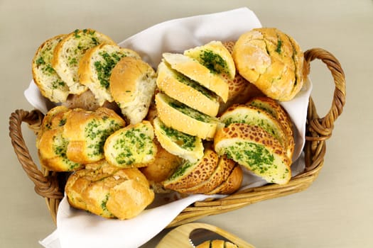 Delicious homemade herb and garlic crusty bread in a basket.