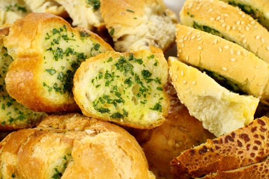 Delicious homemade herb and garlic crusty bread ready to serve.