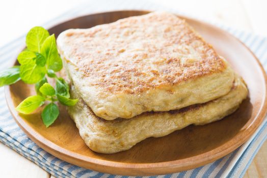 Martabak or murtabak, also mutabbaq, is a stuffed pancake or pan-fried bread which is commonly found in Saudi Arabia,  Yemen, India, Indonesia, Malaysia, Thailand, Singapore, and Brunei.