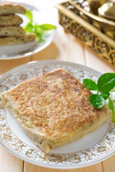 Martabak or murtabak, also mutabbaq, is a stuffed pancake or pan-fried bread. 