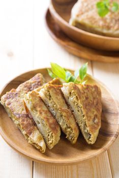 Martabak or murtabak, also mutabbaq, is a stuffed pancake is commonly found in Arab.
