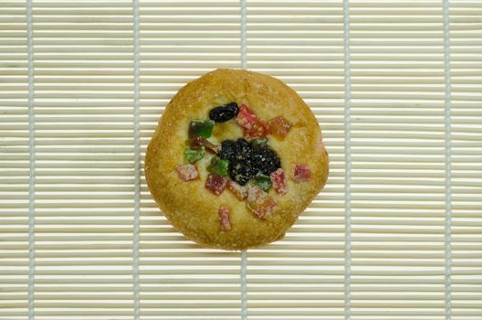 bread with raisin and  dried fruits on wooden background
