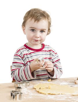 cute child with dough isolated on white background. horizontal image