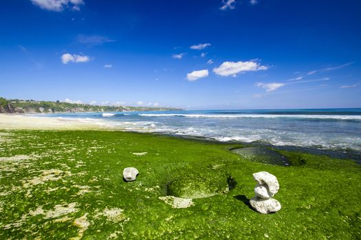 Beautiful tropical beach with white stones on the rocks