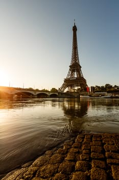 Eiffel Tower and Cobbled Embankment of Seine River at Sunrise, Paris, France
