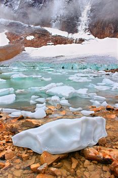 Icebergs float in glaical meltwater from the Angel Glacier in Jasper National Park of Canada.