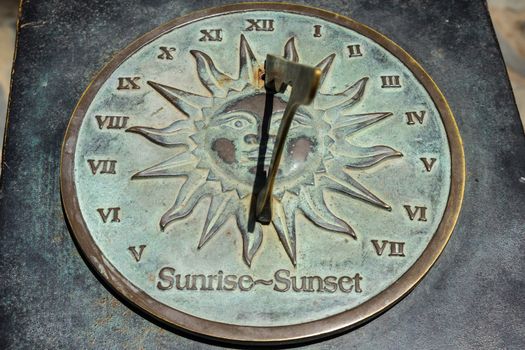 Old sun clock dial - Vintage sundial with shadow