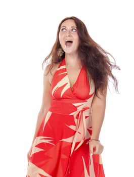 Portrait of a smiling young woman in red dress on white background