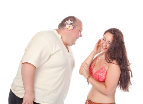 Young cheerful couple in summer clothes, have fun on white background