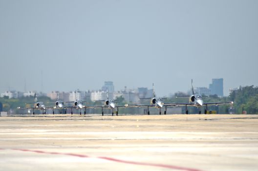 BANGKOK, THAILAND - MARCH 23: Airplanes L - 39UTI  Breitling Jet Team Under The Royal Sky in Don Muang Air Force in Bangkok, Thailand on March 23, 2013