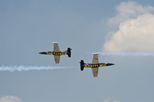 BANGKOK, THAILAND - MARCH 23: Airplanes L - 39UTI  Breitling Jet Team Under The Royal Sky in Don Muang Air Force in Bangkok, Thailand on March 23, 2013