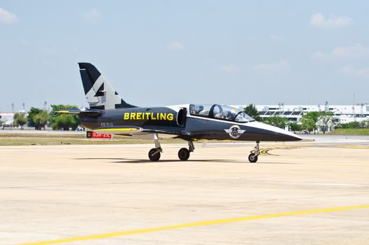 BANGKOK, THAILAND - MARCH 23: Airplanes L - 39UTI  Breitling Jet Team Under The Royal Sky in Don Muang Air Force in Bangkok, Thailand on March 23, 2013