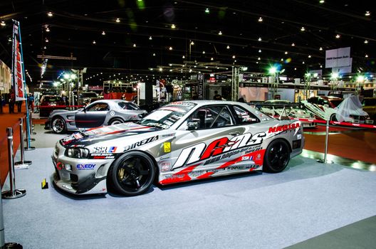 BANGKOK - JUNE 20 : Nissan Skyline R34GT-R car on display at Bangkok International Auto Salon 2013 Exciting Modified Car Show on June 20, 2013 in Bangkok, Thailand.