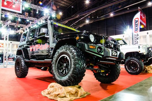 BANGKOK - JUNE 20 : Jeep Safari car on display at Bangkok International Auto Salon 2013 Exciting Modified Car Show on June 20, 2013 in Bangkok, Thailand.