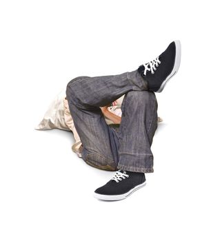 Boy lying on a floor with cross leg