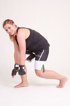 Young woman doing exercises for a better figure