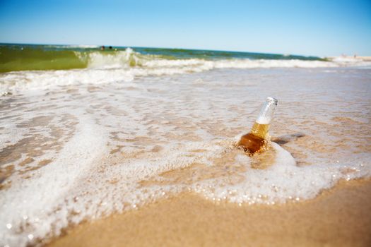 bottle of beer in the sea